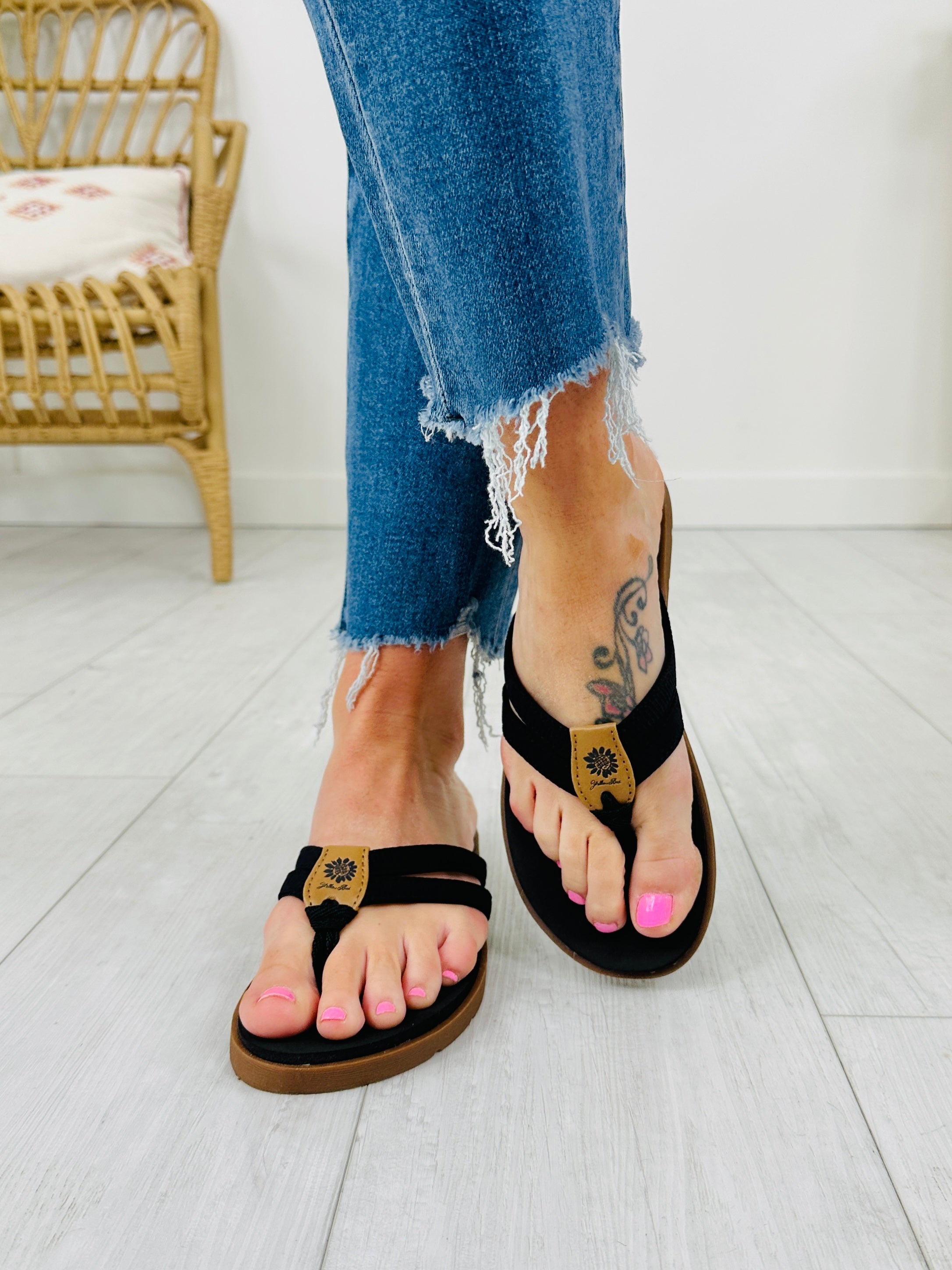 Sandy Strides Flip Flops in Black
