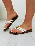 Sandy Strides Flip Flops In White