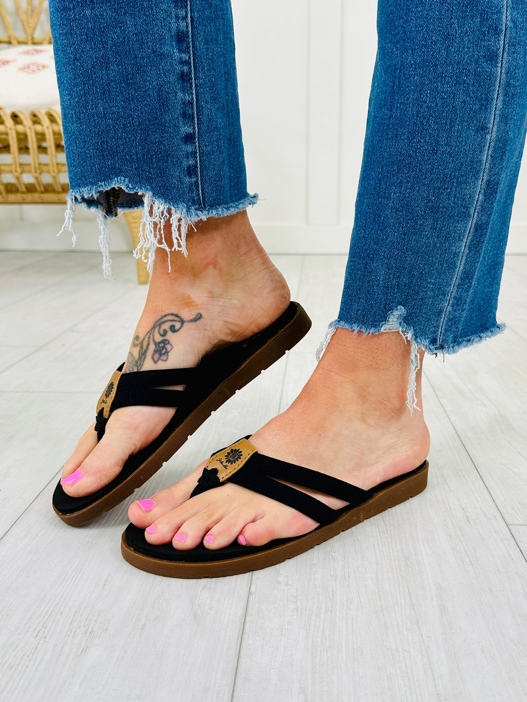 Sandy Strides Flip Flops in Black